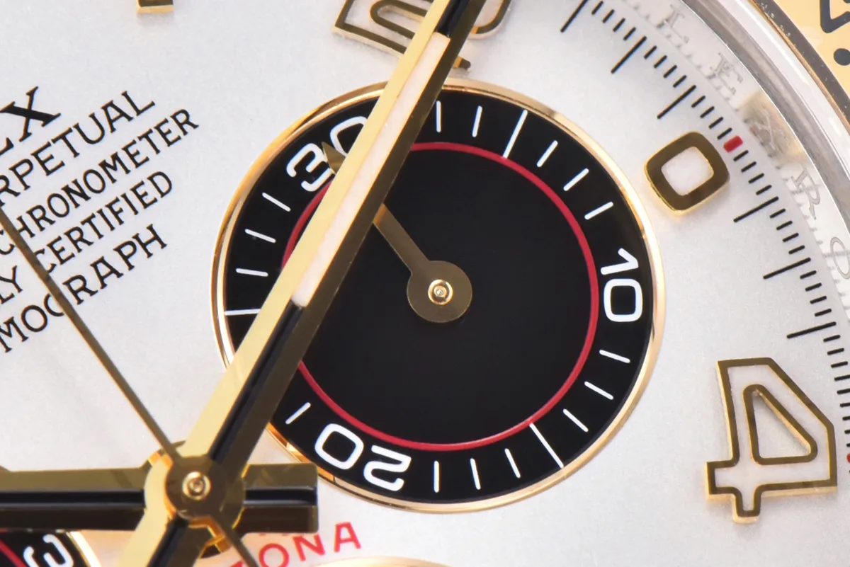 Daytona-116519-White-Dial-in-Yellow-Gold-4.jpg